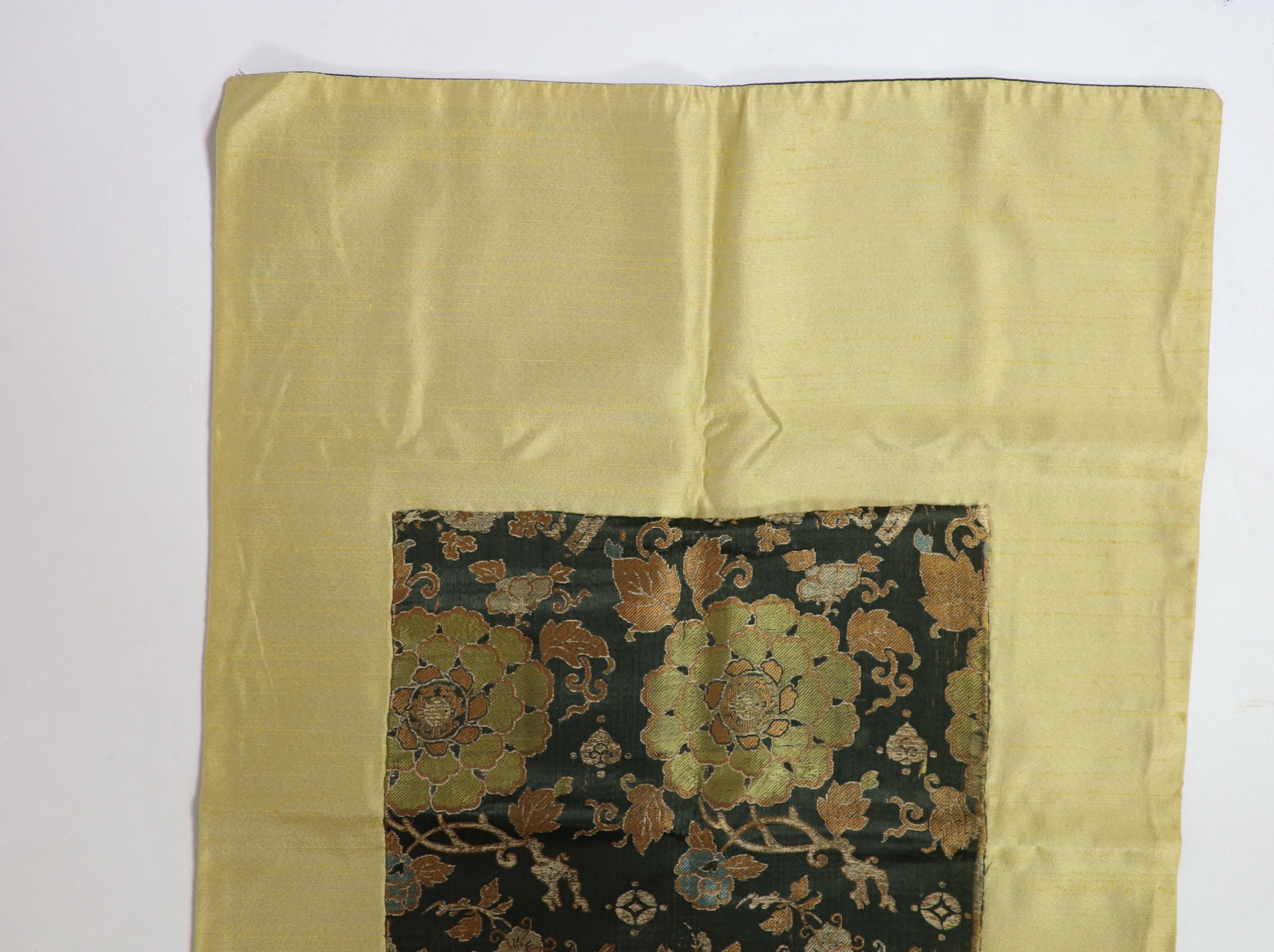 A Chinese brocade panel, 17th/18th century, Total size 169cm x 54cm